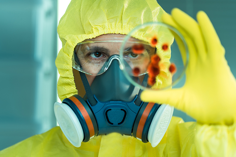 Man working with dangerous viruses in the laboratory