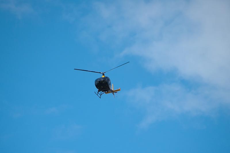 Small helicopter in flight.