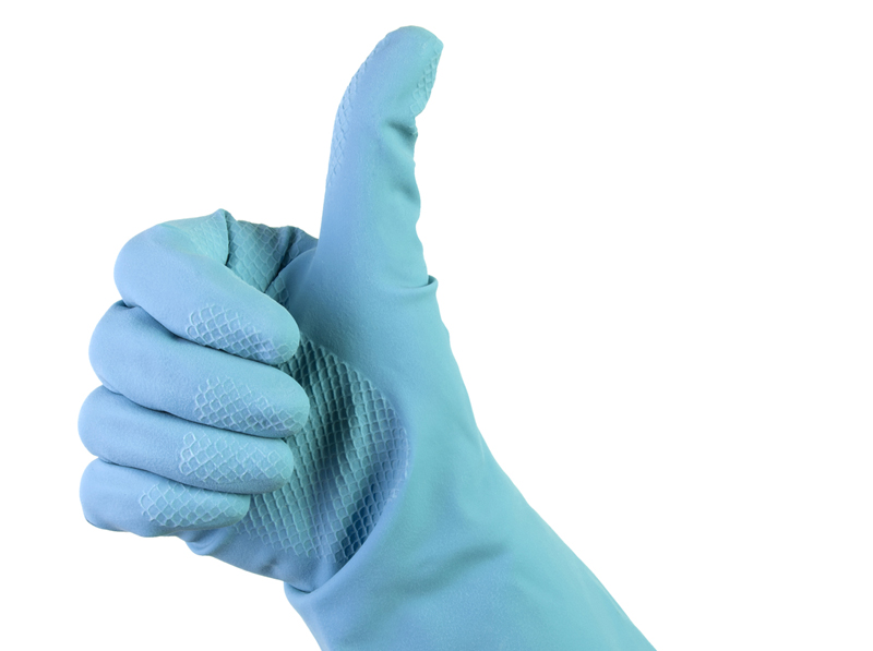 Thumbs up with a blue vinyl glove