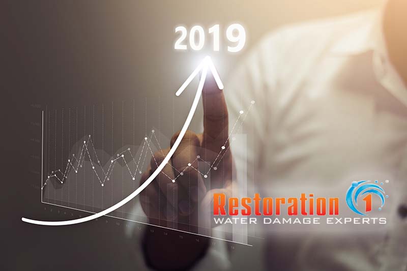Businessman plan growth and increase of positive indicators in his business. Business growth concept year 2019