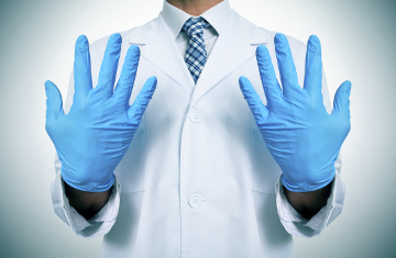 doctor with medical gloves