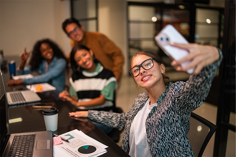 Gen Z on phone at work