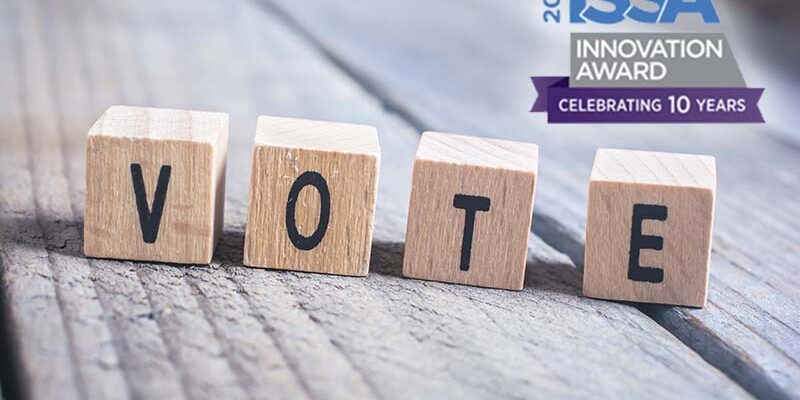 Macro Of The Word Vote Formed By Wooden Blocks On A Wooden Floor