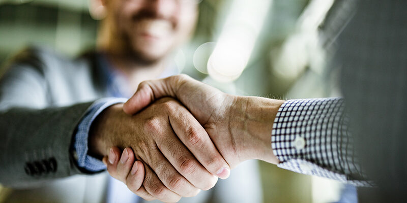 men shaking hands