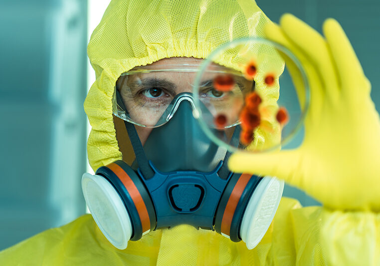 Man working with dangerous viruses in the laboratory