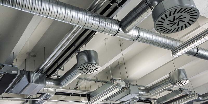 A detail of the air conditioning on the ceiling of the industrial building.