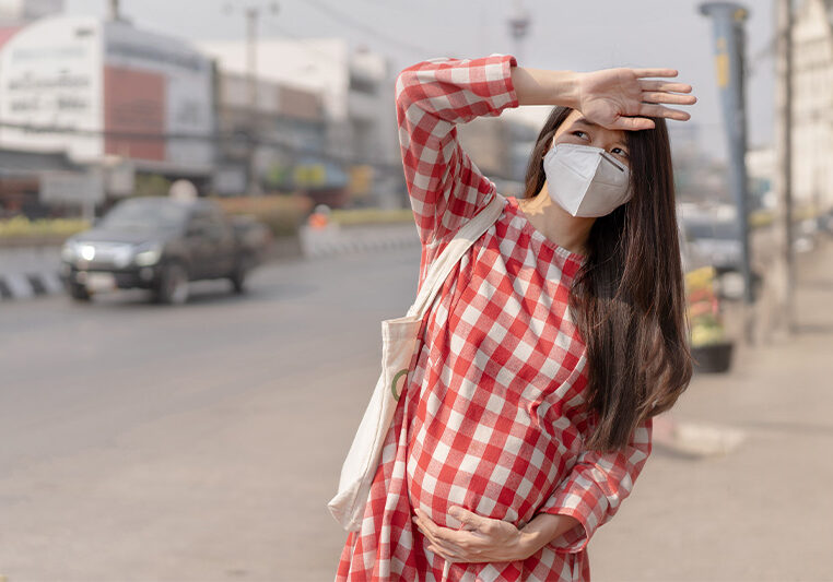 pregnant woman in facemask