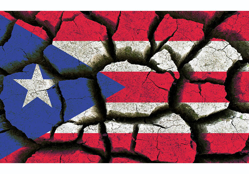 Puerto Rico flag painted on cracked earth background.