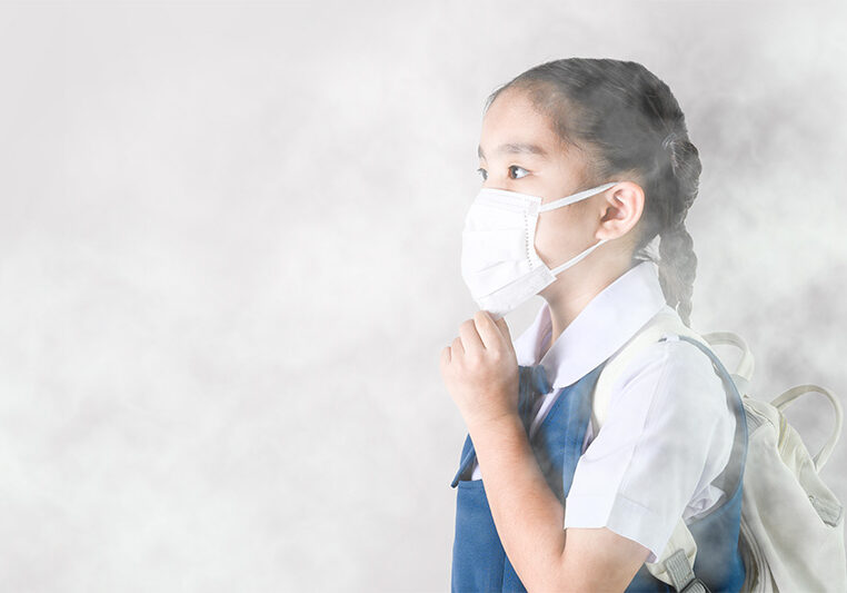 School girl in smog