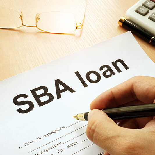 SBA loan form on a table.