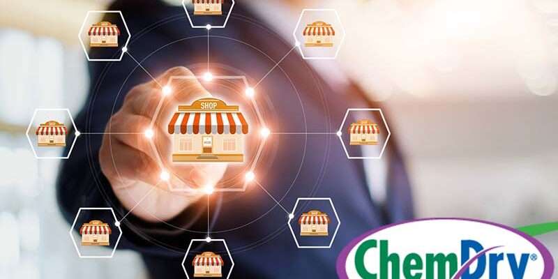 Businessman hand touching icon global network connection on franchise marketing system. Branch of market and customer. Modern technology business.