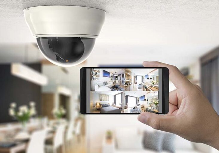 hand holding 3d rendering mobile connect with security camera