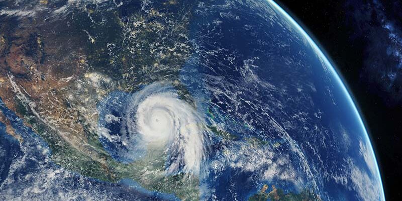 hurricane approaching the American continent visible above the Earth, a view from the satellite.