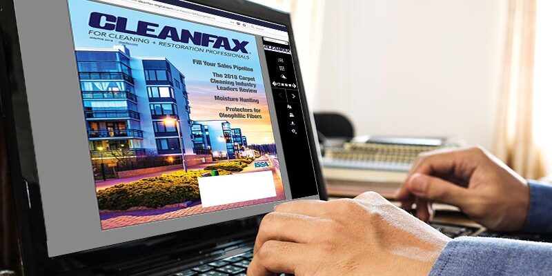 Hand using laptop at home office, with copyspace on laptop screen