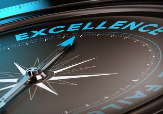 Compass with focus on the word excellence. Quality service concept suitable for motivational poster or header of a website. Blue and black tones