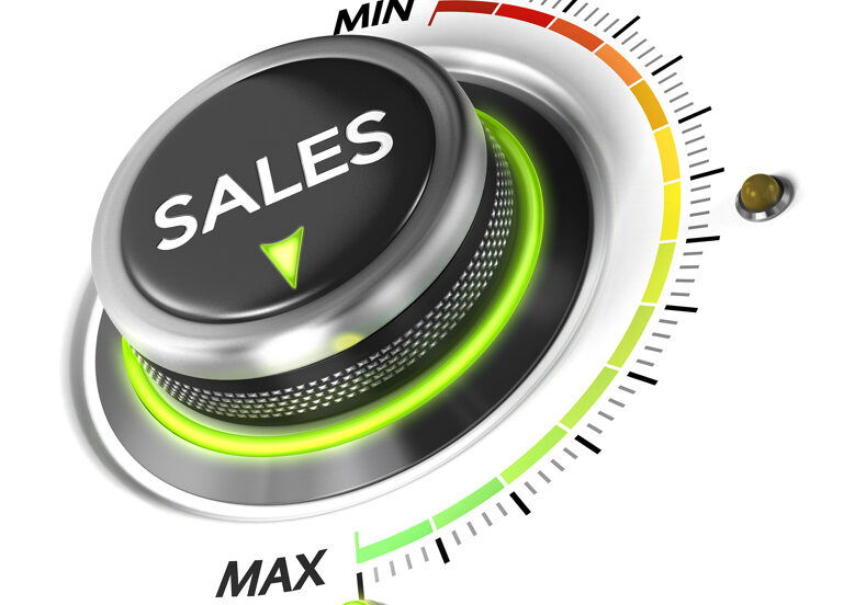 Sales switch button positioned on maximum, white background and blue light. Conceptual image for sales strategy and growth of incomes.