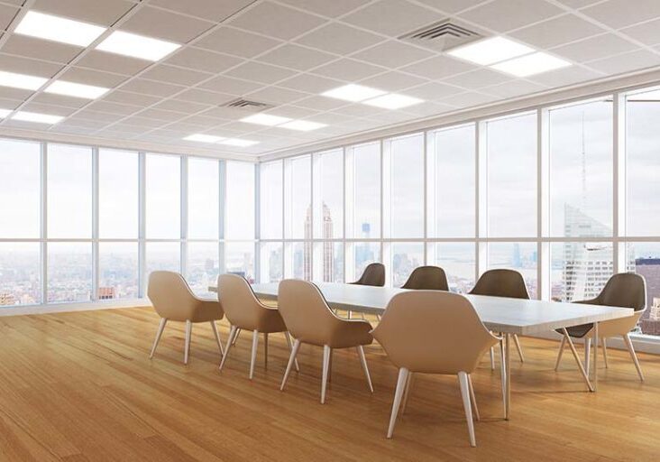 Modern conference room interior with panoramic city vew, wooden floor and daylight. 3D  Rendering