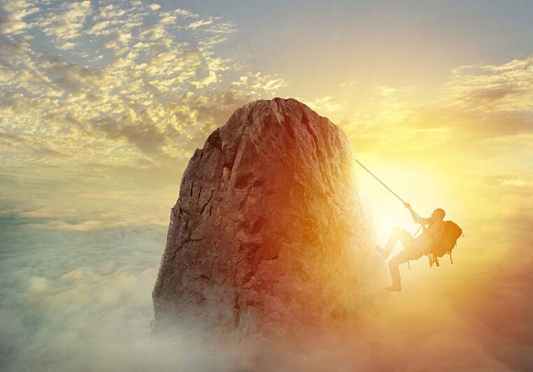 Businessman climb a mountain with a rope to get the flag. Achievement business goal and difficult career concept