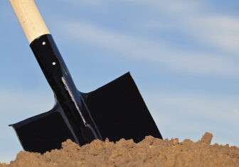 Shovel in the heap of ground